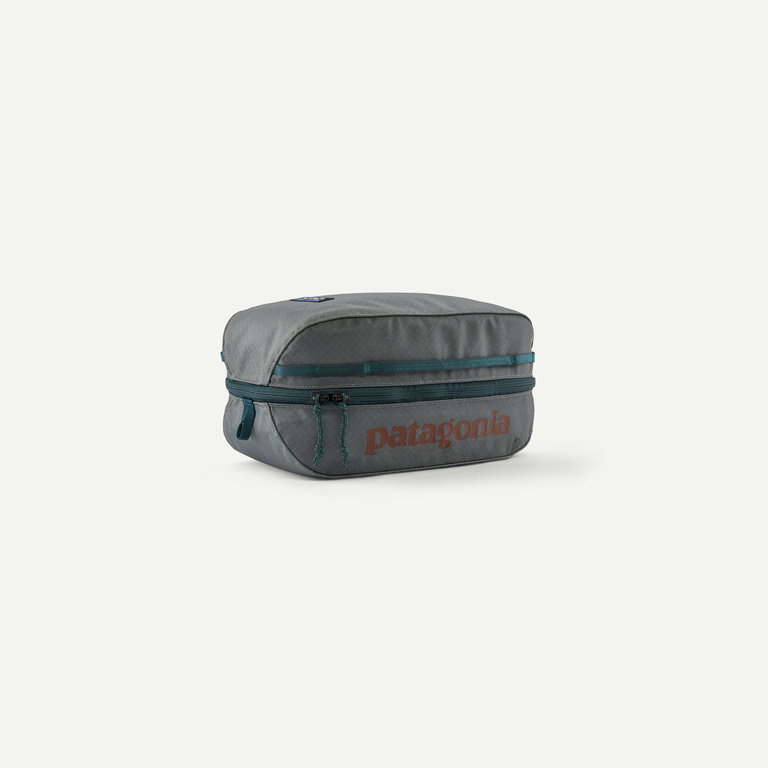 patagonia toiletry bags Black Hole Mini MLC Pack 30L Luggage Pros Plastic zipper sliders for corrosion resistance in saltwater applications Wash Bag Patagonia Small Bag